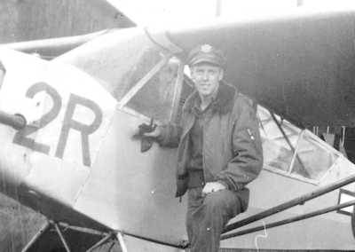 Jim Helinger with his L-5 Stinson Spotter Plane
